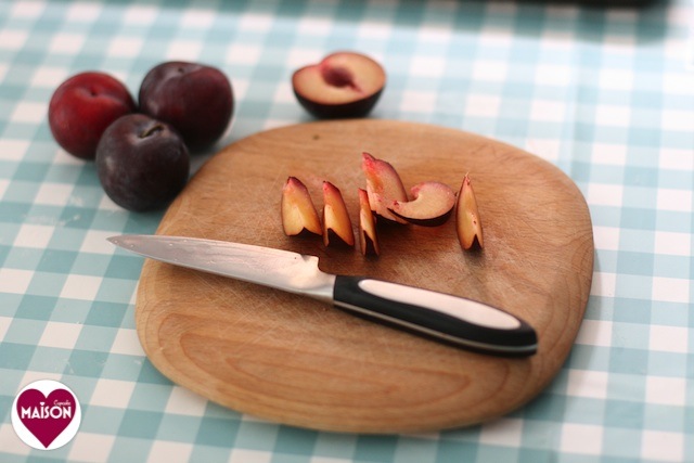 Cutting plums for plum and almond galettes, a Dead Easy Dessert by MaisonCupcake.com using puff pastry, fresh fruit and nuts - ready in under 30 minutes #quick #easy #recipes