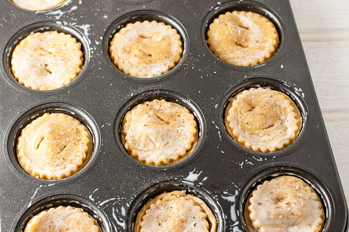 glazing vegan pastry with thinned soya cream and cinnamon sugar