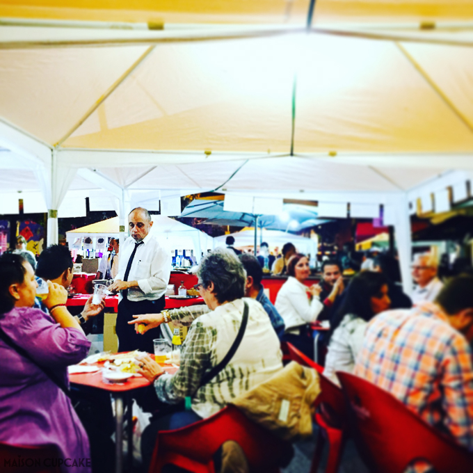 Barcelona street festival by night bar selling sangria