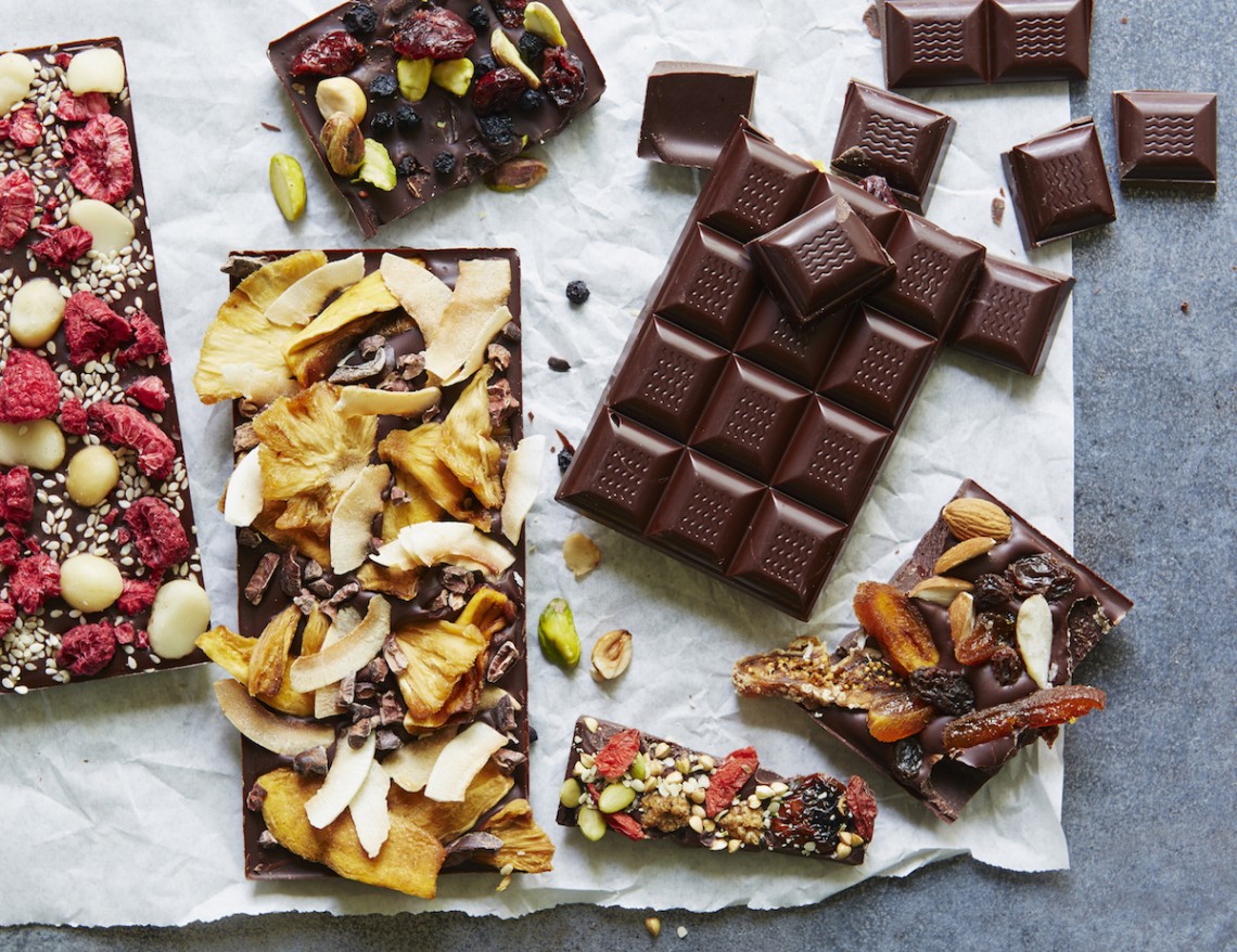 How to make your own chocolate without flavourings, emulsifiers or powders. Rich and intense tempered glossy chocolate with a good "snap" when broken; make your own chocolate bars as edible gifts - recipe from Clean Cakes by Henrietta Inman