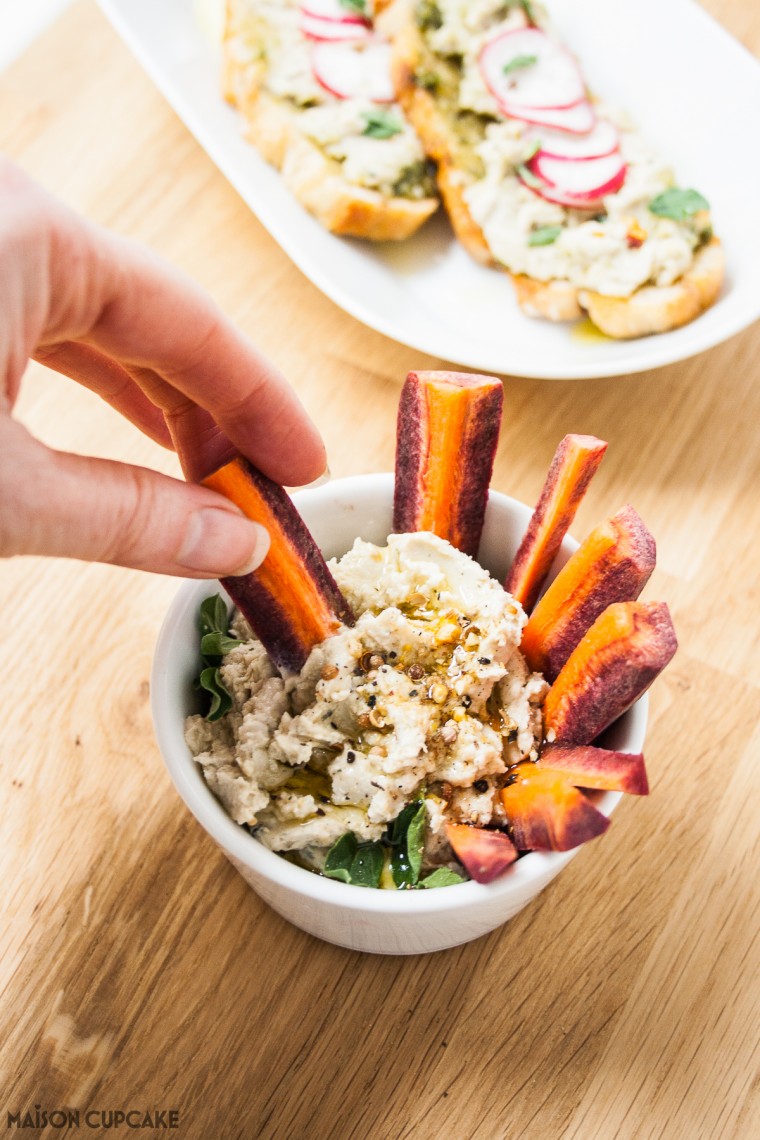 White bean hummus with homemade pesto with purple carrots - easy to make with canned beans or dried pulses as a summer appetiser, vegetarian bean dip or sandwich filling