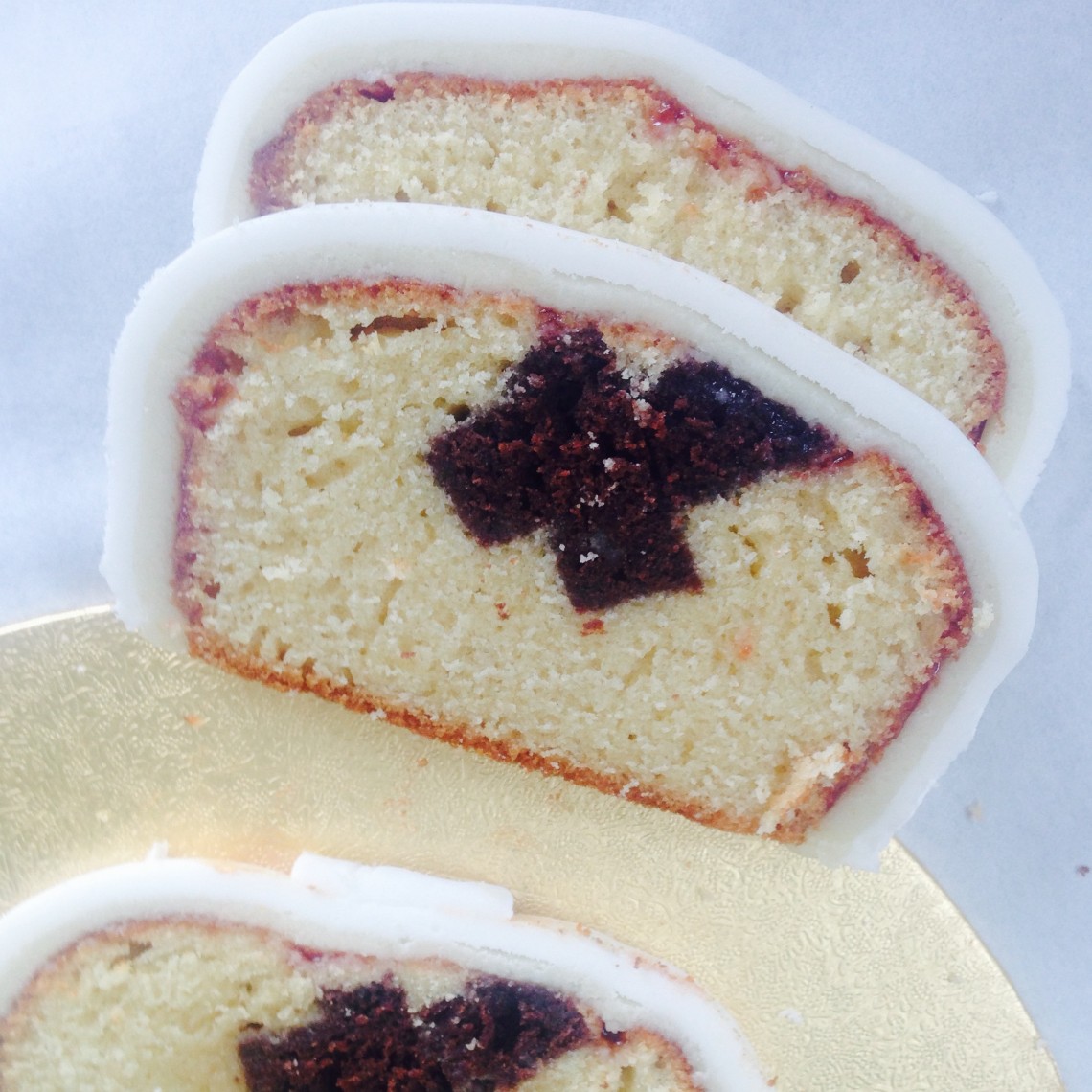 You won't believe this First Communion Cake with hidden chocolate sponge crucifix inside