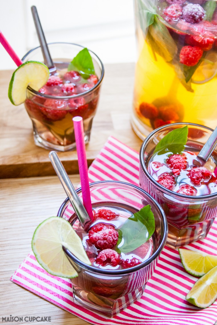 Quench your thirst this summer with this quick and easy refreshing cocktail mocktail idea - iced green tea fruit cup raspberry drink with lime and basil perfect for parties and barbecues