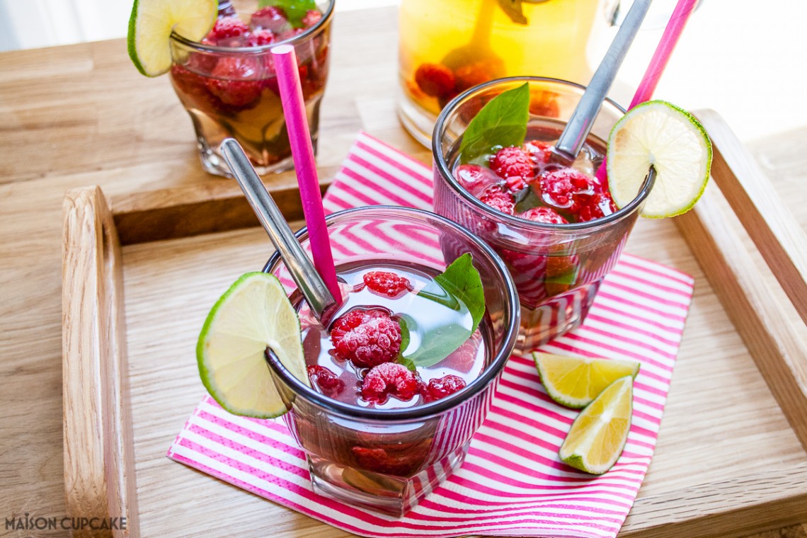 Quench your thirst this summer with this quick and easy refreshing cocktail mocktail idea - iced green tea fruit cup raspberry drink with lime and basil perfect for parties and barbecues