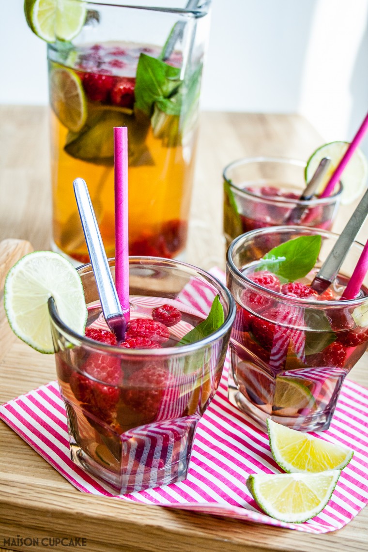 Quench your thirst this summer with this quick and easy refreshing cocktail mocktail idea - iced green tea fruit cup raspberry drink with lime and basil perfect for parties and barbecues