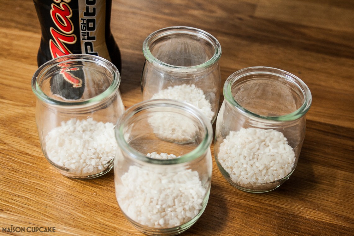 Making individual rice puddings with Mars Bar milk 