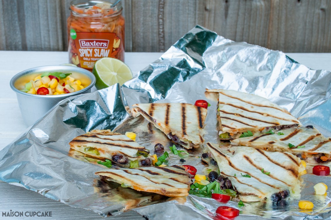 Quick and easy quesadillas stuffed with chicken and spicy slaw - veggie black bean option too