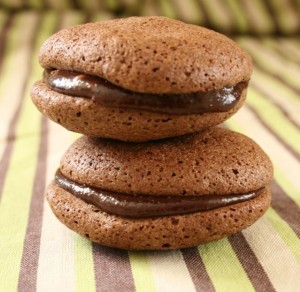 Chocolate macarons with beetroot chocolate fudge filling