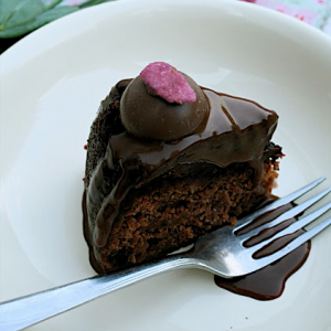 Strawberry chocolate cake with rose tea ganache