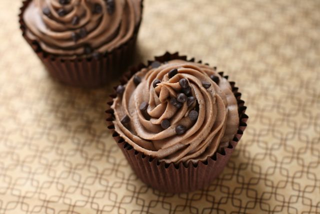 Maison Cupcake - Chocolate Bailey's Cupcake with piped buttercream swirl and choc chips