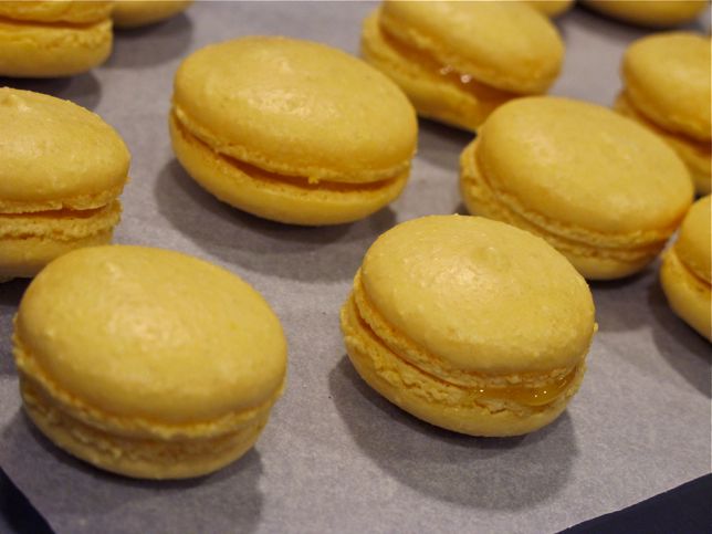 yellow macarons on tray