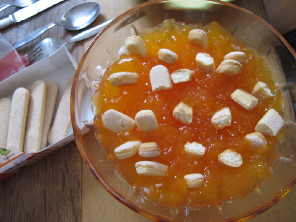 Sponge fingers in orange jelly for emergency trifle