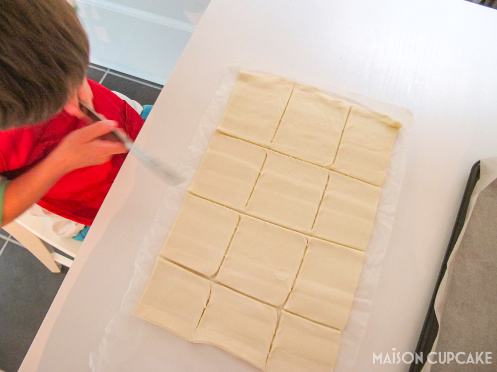 Peanut Butter Jelly Parcels With Puff Pastry - steps - cutting pastry into squares