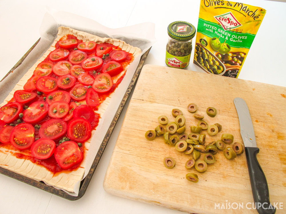 Tomato Olive Caper Tart - steps - chopping olives