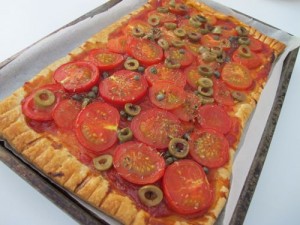 Tomato, olive and caper tart