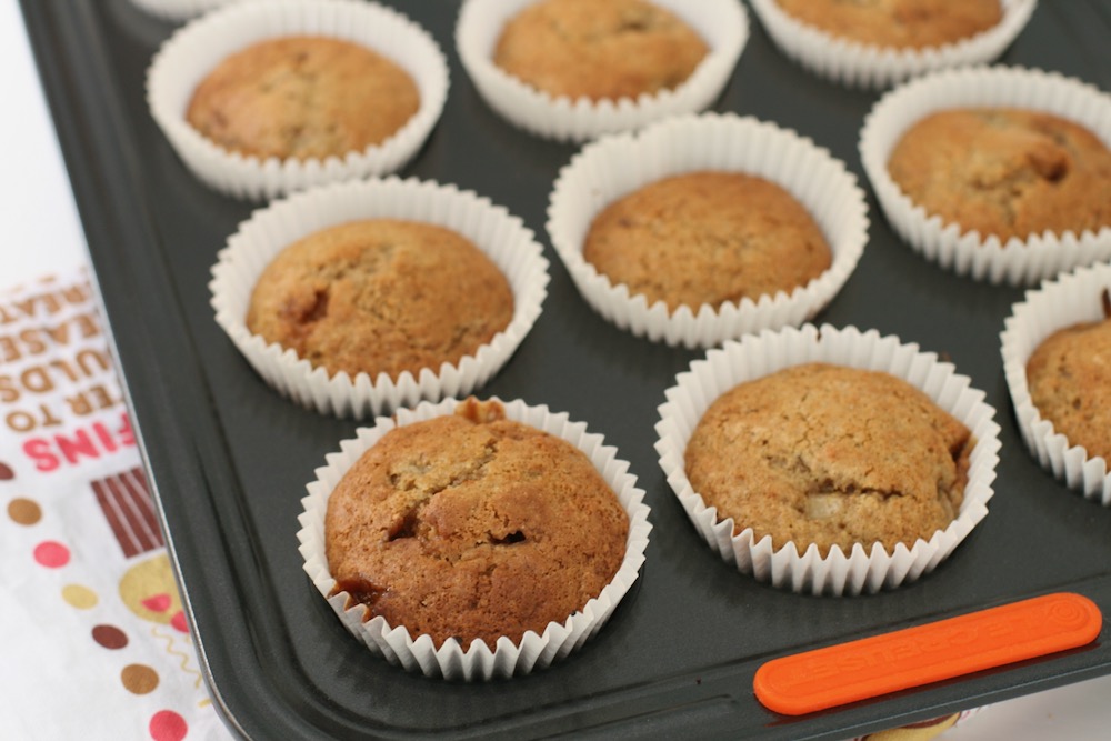 Tray of golden Banana Fudge Muffins just baked in Le Creuset baking tray
