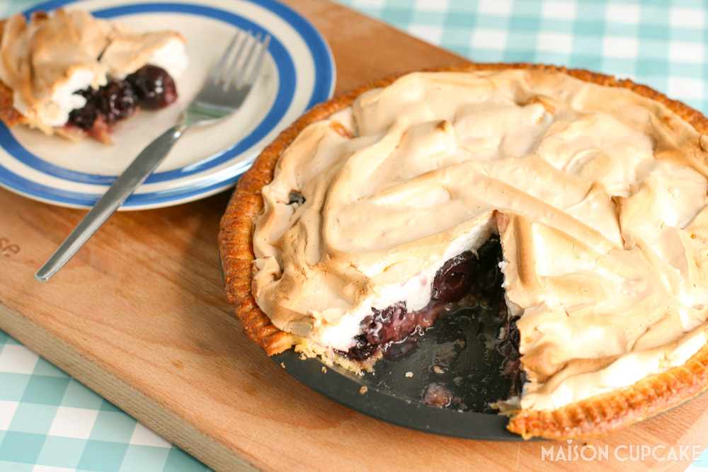 Cherry Meringue Pie with slice on plate