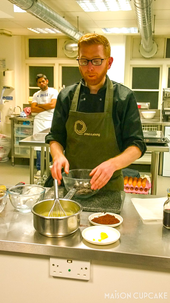 Chocolate Truffle Making Workshop With Paul A Young - portrait whisking in kitchen
