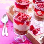 Rhubarb Raspberry Cheesecake portrait with spoons and tray