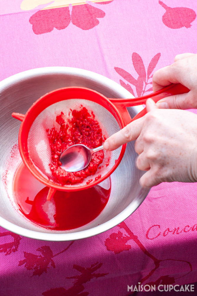 Rhubarb Raspberry Cheesecake Steps - straining raspberry juice