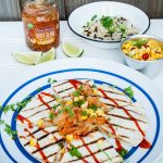 Quick and easy quesadillas stuffed with chicken and spicy slaw - veggie black bean option too