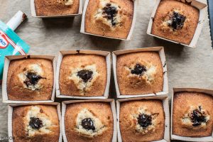 Cupcakes with chocolate filling in square boxes