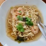 Tom Yum Prawn Noodle Soup in a white bowl