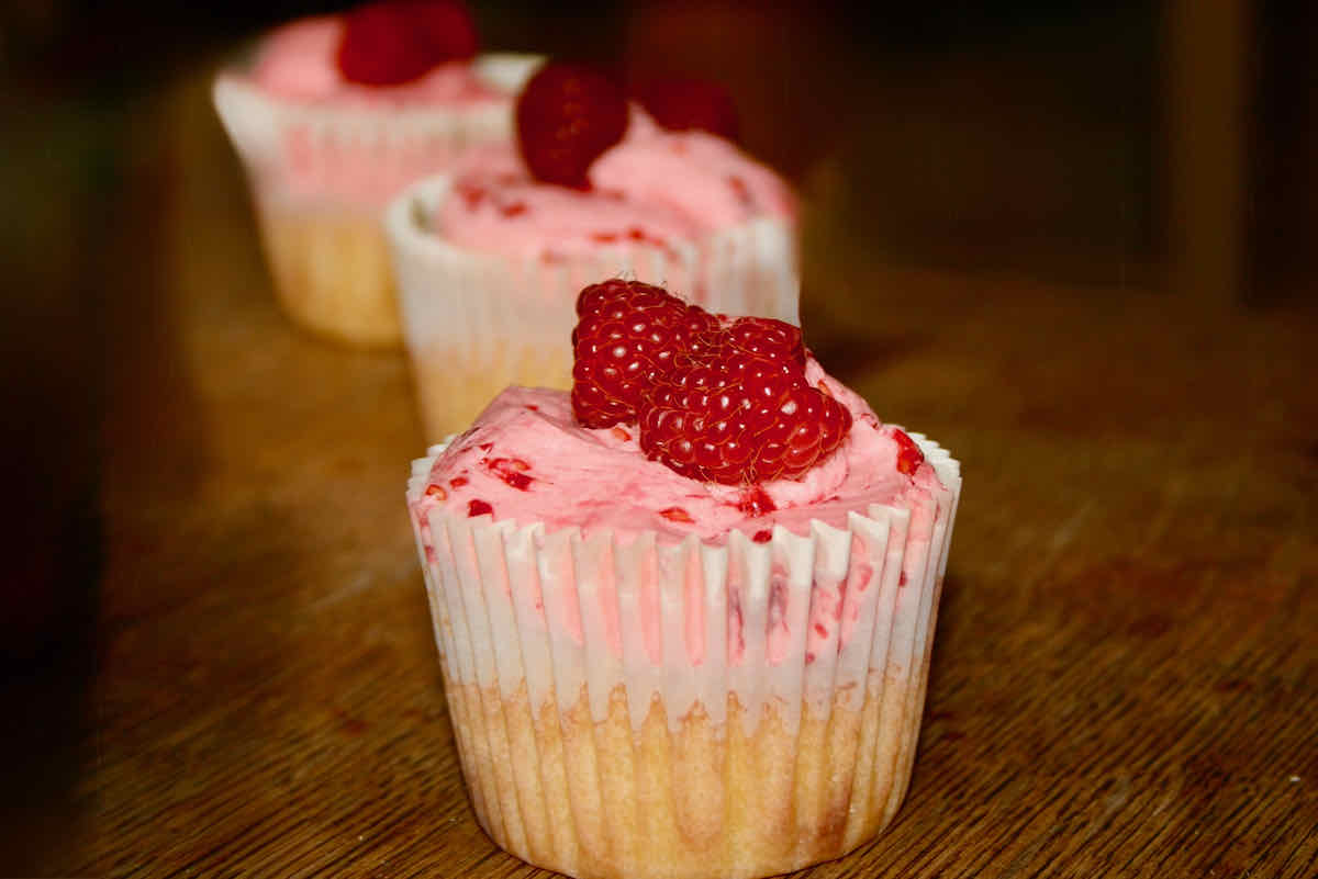 Crushed raspberry cupcakes with pink icing.