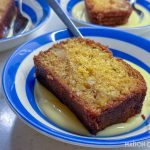 Apple Pound Cake with Pine Nuts in striped cornish blue bowls with custard