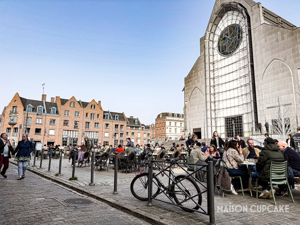 Place Gilleson in Lille with outdoor cafes and Cathedral Notre-Dame-de-la-Treille.