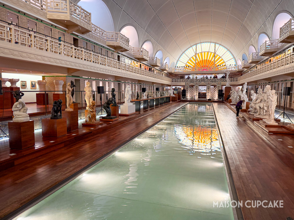 Artworks displayed inside Roubaix's former swimming pool, now La Piscine Museum.