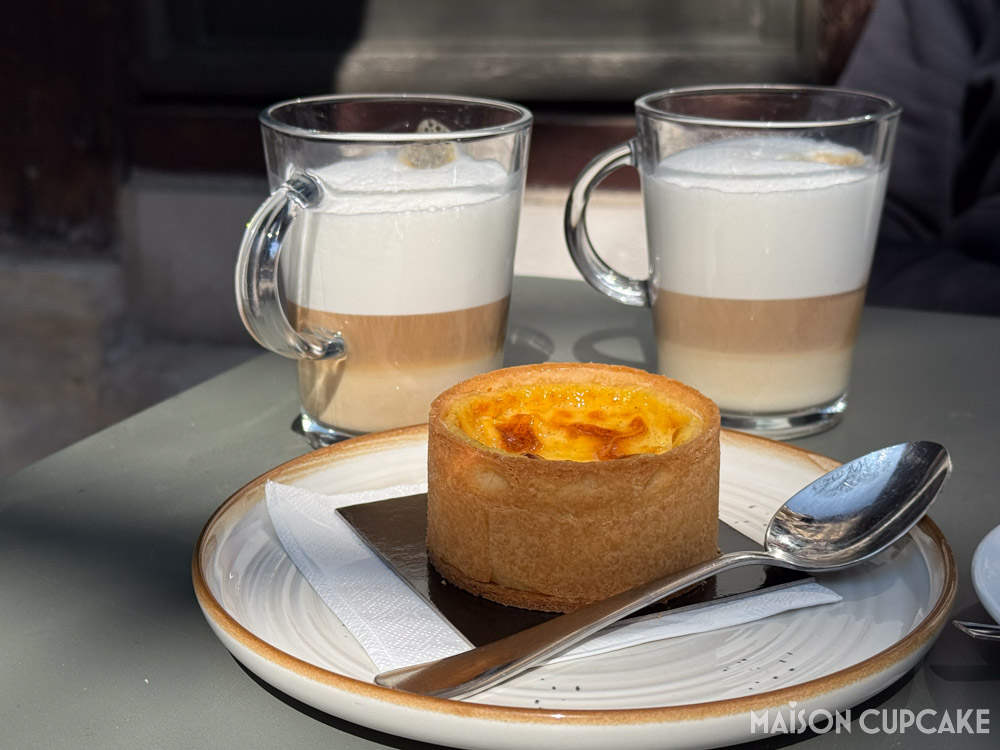Vanilla Flan and Coffee on cafe table in Rouen: Les Patisseries de Gill.