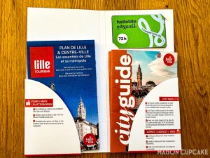 Wallet containing Lille City Pass, map and guide