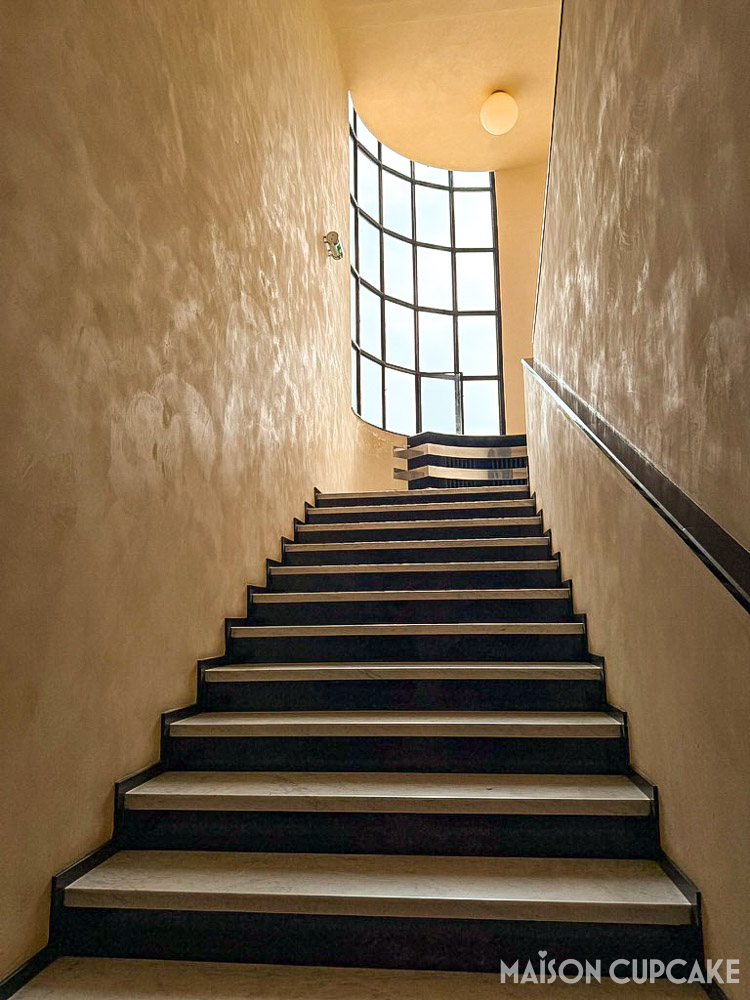 Stairwell at Villa Cavrois with large windows and natural light geometry