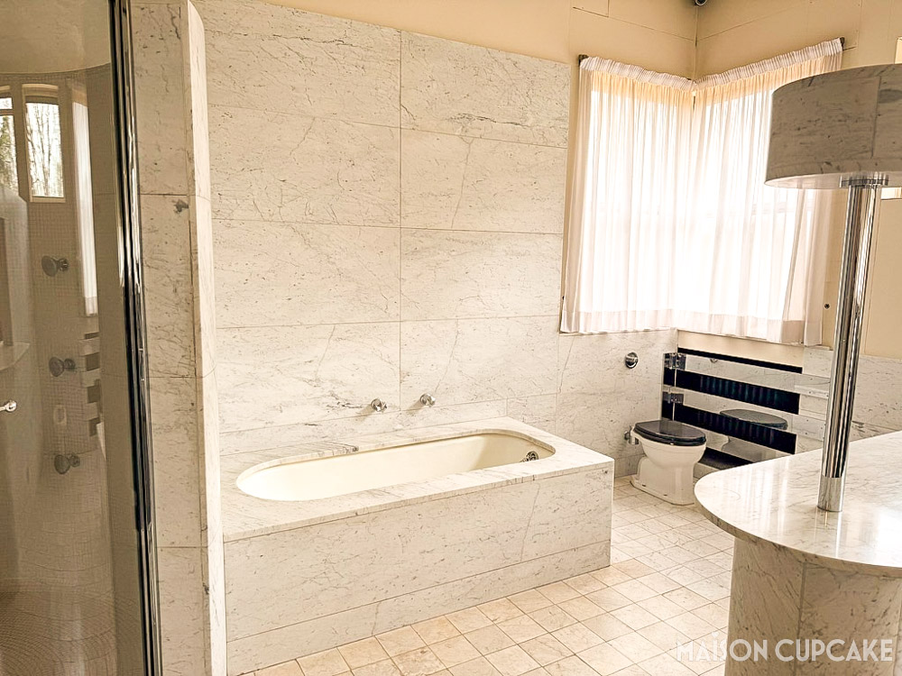 Bathroom interior at Villa Cavrois featuring bold Art Deco surfaces and fixtures